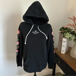 Hollister Black Hoodie with Pink Floral Sleeves, Unique, Size Medium